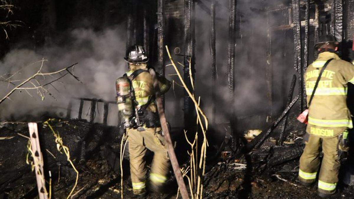 West Charlotte fire near school, baseball fields intentionally set, department says