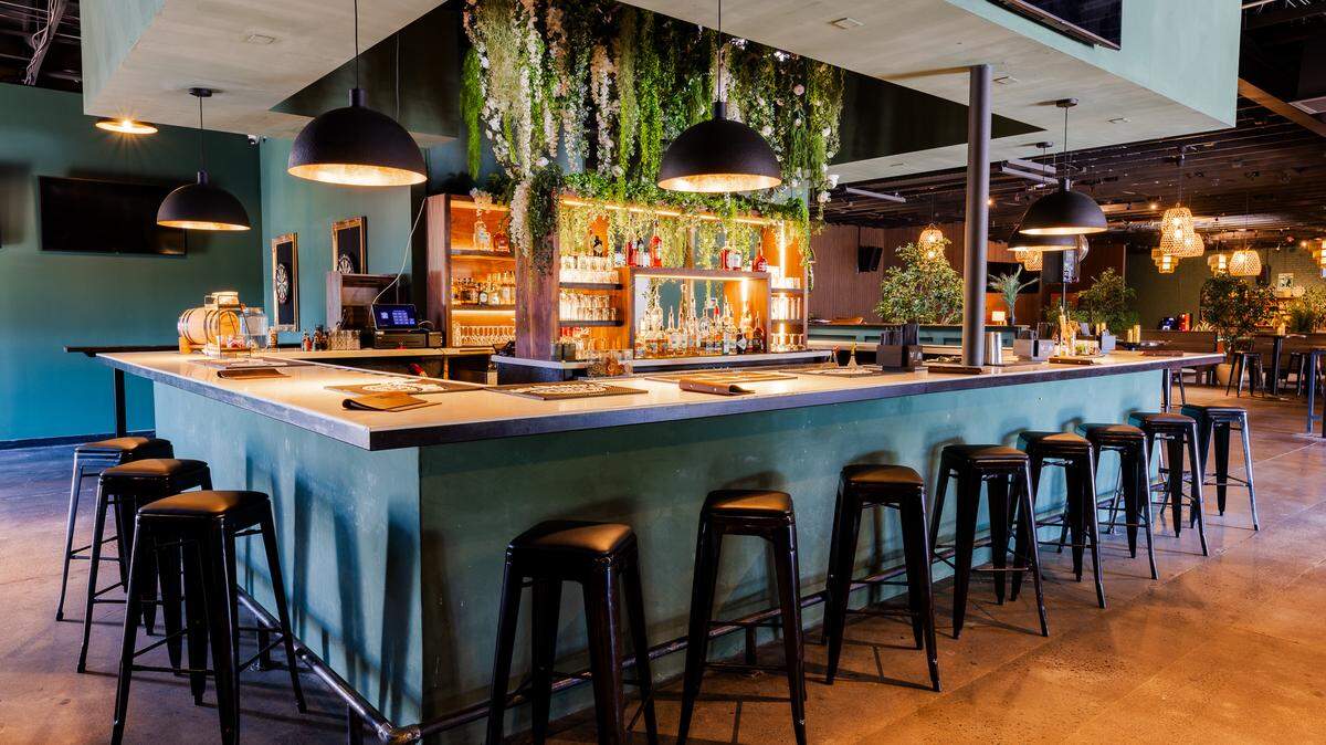 Cocktails, cornhole + a dance floor: New entertainment venue opens in South End