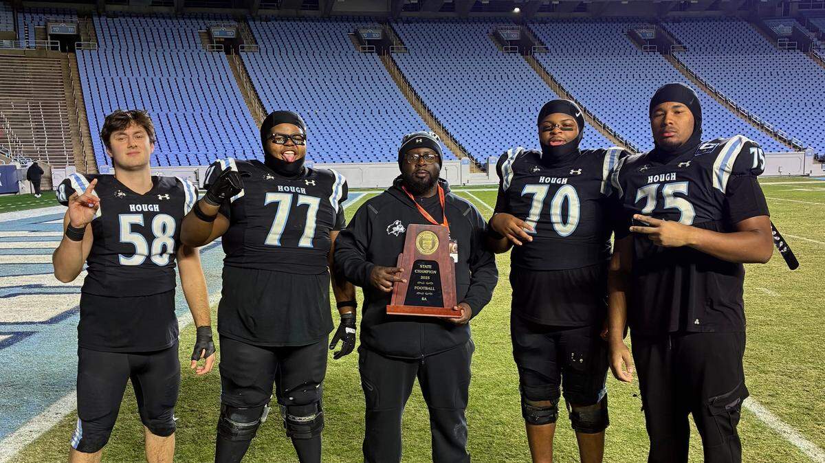 Hough High rallies around football coach after cardiac arrest leaves him in ICU