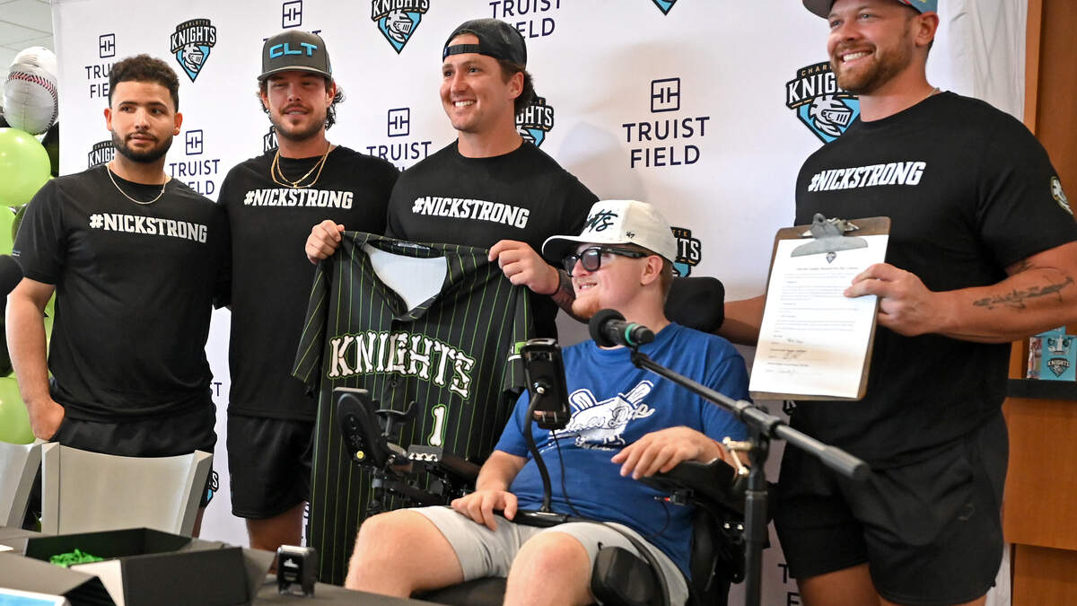 Jersey design contest winner, Levine Children’s patient is a Charlotte Knight for a day