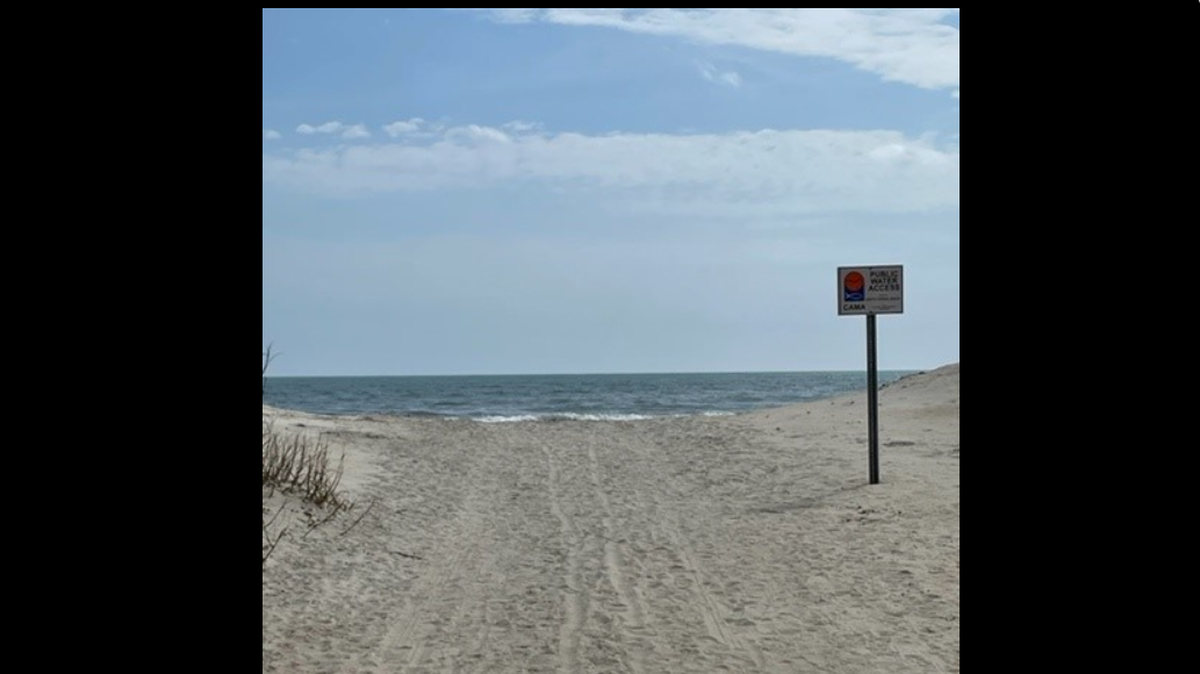 Swimmer vanishes while trying to save child who drifted from beach, NC town says