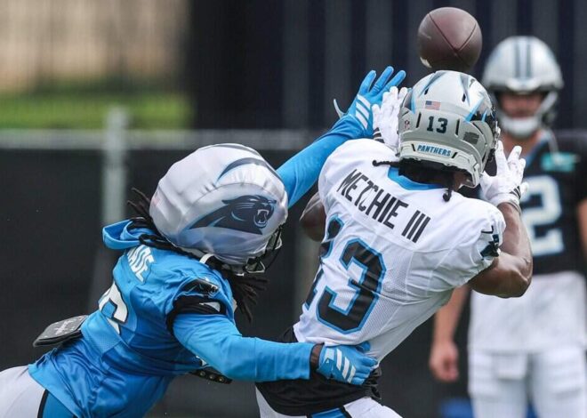 Fists, a helmet and Jonathon Brooks fly in first Carolina Panthers padded practice