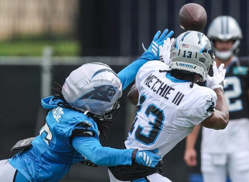 Fists, a helmet and Jonathon Brooks fly in first Carolina Panthers padded practice