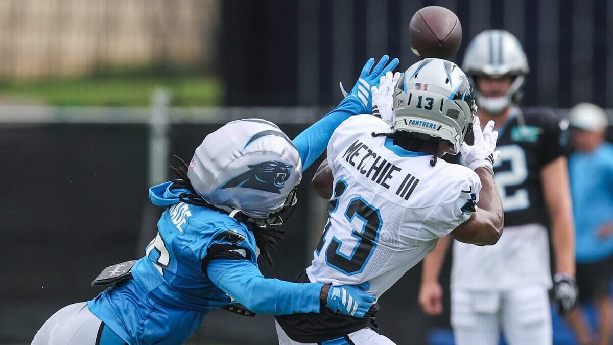 Fists, a helmet and Jonathon Brooks fly in first Carolina Panthers padded practice