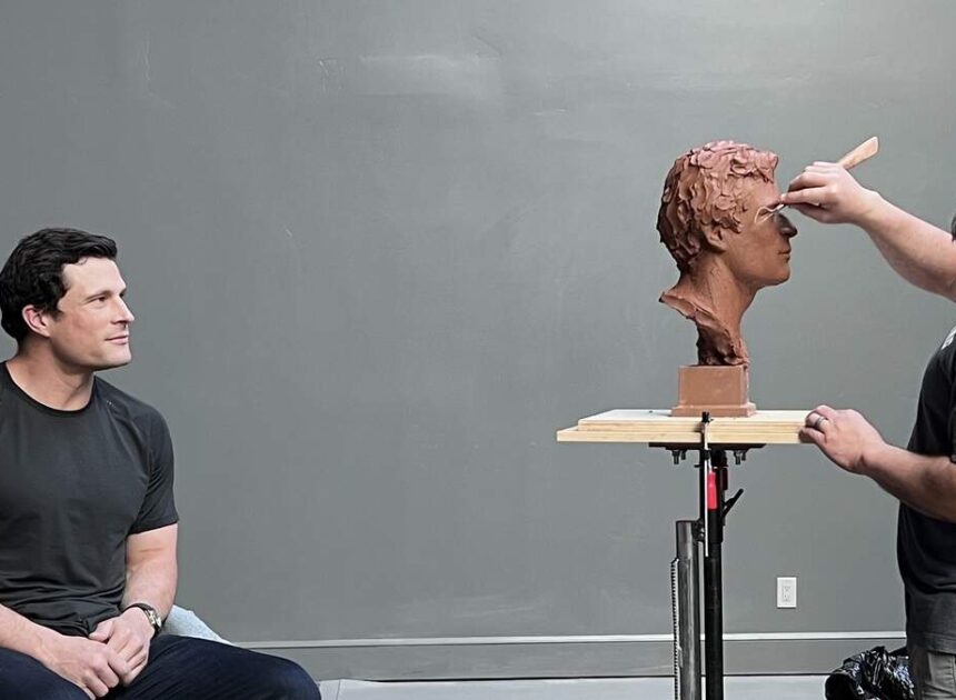 Sculpting Lu-u-u-ke: Behind the scenes as Kuechly strikes pose for hall of fame