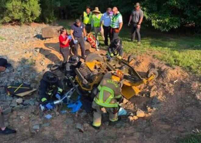 Huge mower rolls over, traps rider, NC responders say. See the rescue.