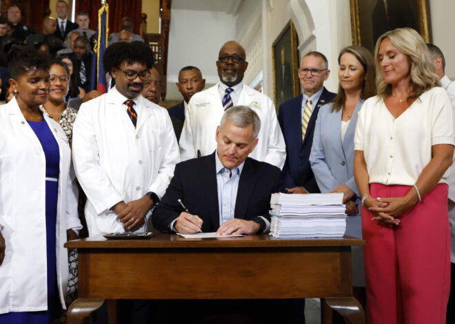 NC budget with year-delayed raises is now law. Gov. Stein signs spending plan