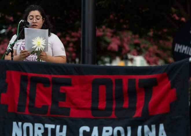 At uptown vigil, protesters condemn ICE killings, planned NC detention facility