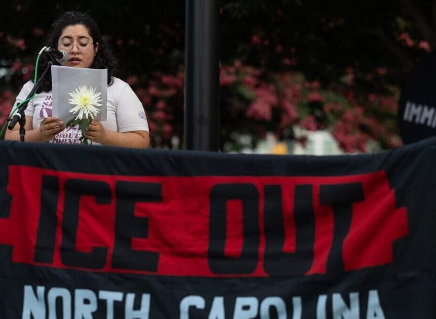 At uptown vigil, protesters condemn ICE killings, planned NC detention facility
