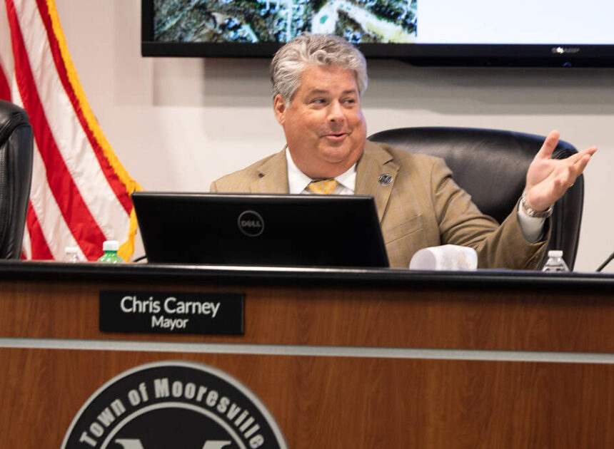 Mooresville Mayor Chris Carney, rebuked over pantless claims, surfaces in Italy