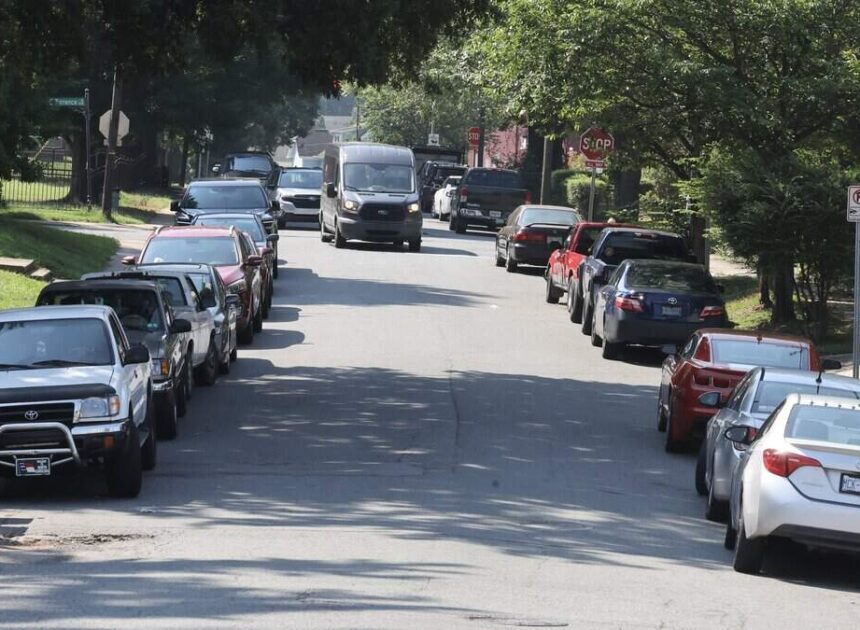 ‘We all suffer.’ New apartment tower floods this Charlotte neighborhood with cars