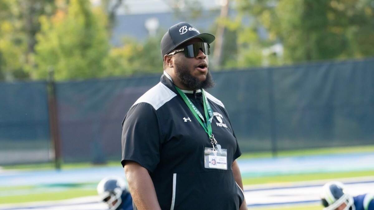Charlotte high school coach let go before he ever coached a game
