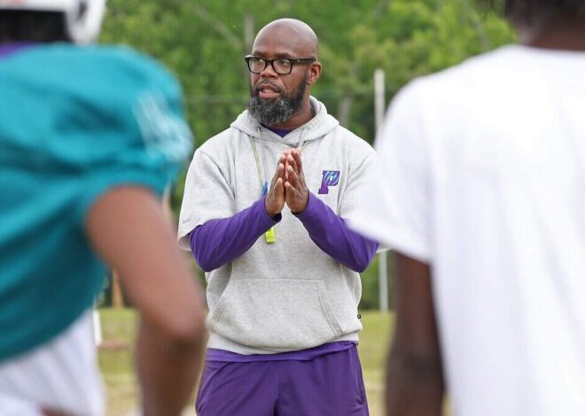 A Charlotte high school football coach has been suspended before start of season