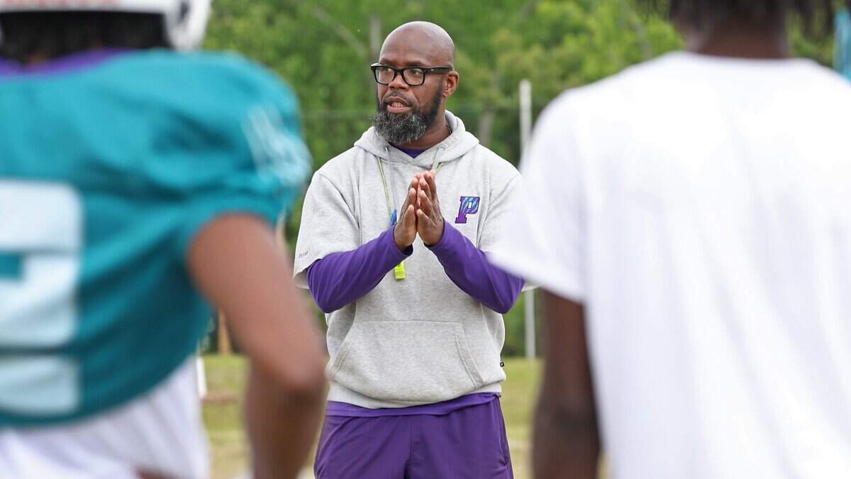 A Charlotte high school football coach has been suspended before start of season