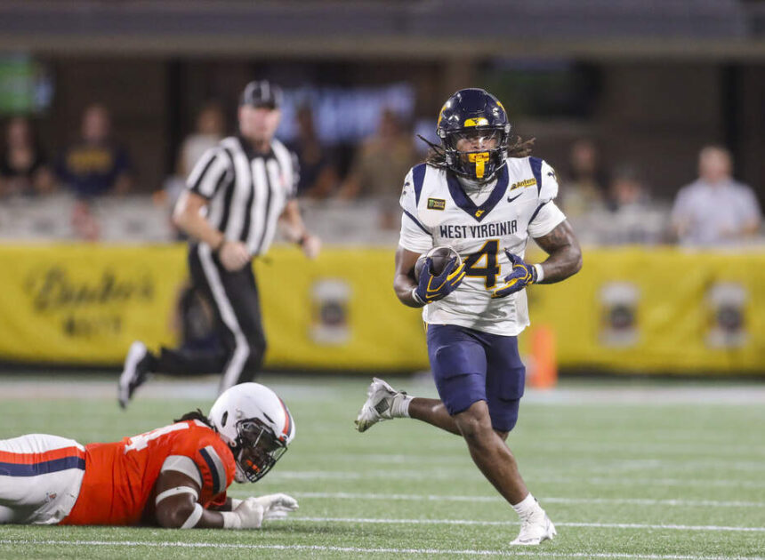 West Virginia football rolls over No. 25 Virginia behind QB Michael Hawkins