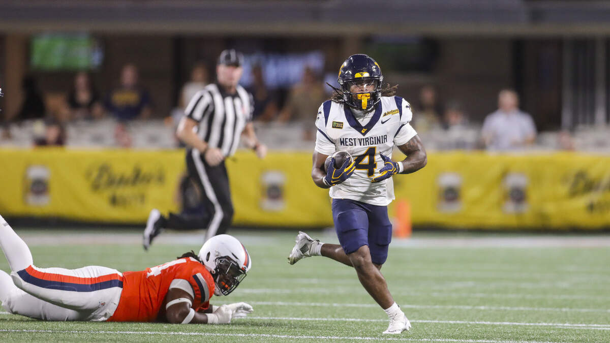 West Virginia football rolls over No. 25 Virginia behind QB Michael Hawkins