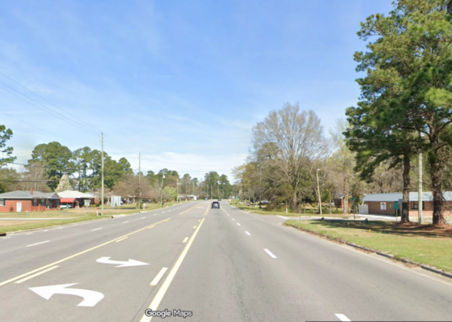 Woman drove for miles with a man clinging to hood of car, NC sheriff says